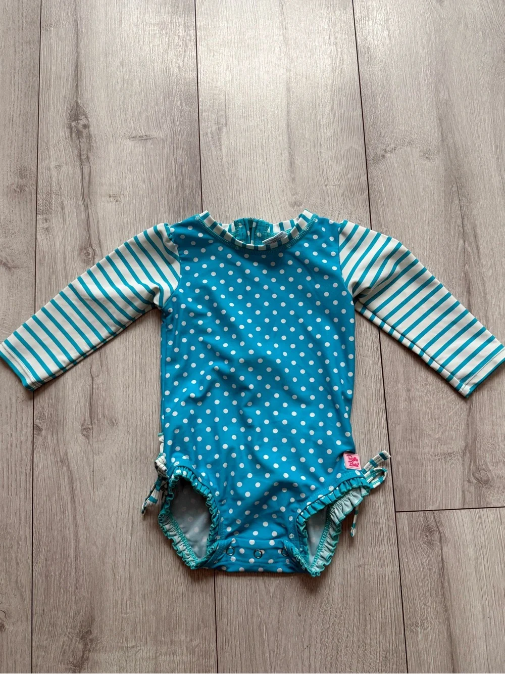 Ruffle Butts Turquoise and White Polka Dot Long-Sleeve One-Piece